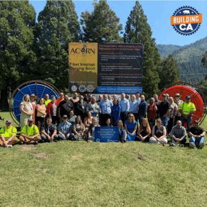 Leaders of CDT, Hoopa Valley Tribal Council, Hoopa Valley Public Utilities District, and CA Public Utilities Commission with community members and construction crew.